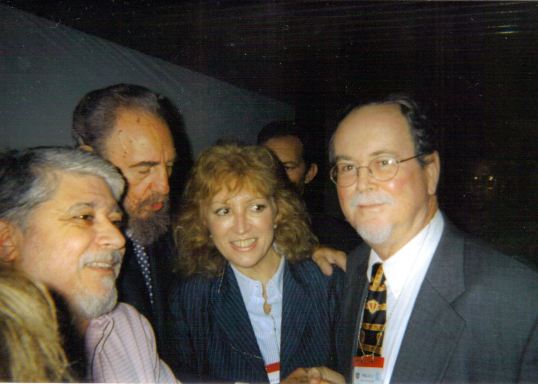 Will Johnson shaking Fidel Castro's hand, with Brazilian Minister of Education in between. Nov 16th 2002