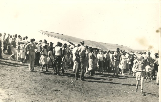 People checking out de Haenen's plane.