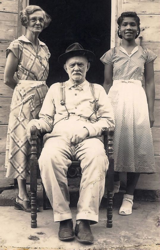 Edward Simmons who gave the land to have the church built on, here with his sister Annie Simmons-Pamenter and a Maid